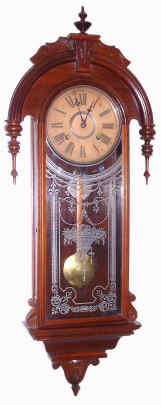 C.1881, Wm. L. Gilbert Clock Co., "EUNOMIA" walnut cased wall clock, 8-day time and strike, spring. — Antique Clocks Price Guide