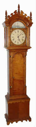C.1974, Heritage Heirlooms, Tiger Maple, Triple chime, 3-weight tall clock with Keininger Movement, and with seconds hand and with strike/silent lever and with tune selector to right, giving choice of Whittington, St. Michaels, or Westminster tune, adding another melody segment at each quarter hour, with the full tune on the hour, followed by a full chord strike. — Antique Clocks Price Guide