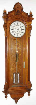 C.1880, Seth Thomas, "Regulator No. 19", in oak, with 2-jar thumb-print pendulum and center seconds, 8-day weight, sometimes referred to is the Santa Fe model because of their use on that rail line. — Antique Clocks Price Guide