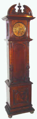 C.1895, German, Polyphon, Musical Tall clock, double comb Polyphon player, with Lenzkirch time and strike movement, in a closed walnut case, music plays at will with selector on left, or on the hour. Most similar to style 64; this one never had glass in door, has walnut panel. Plays 28cm center drive discs. — Antique Clocks Price Guide