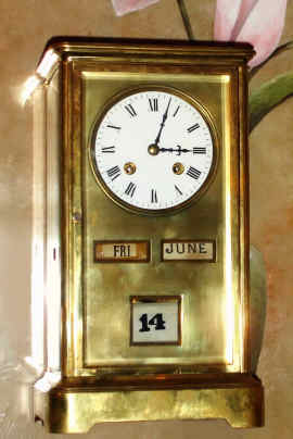 C.1900, French, S. Marti, Crystal Regulator with Calendar: month and day of the week on rollers in the American style, and the date on a silk ribbon, 8-day, bell strike, platform lever movement. — Antique Clocks Price Guide