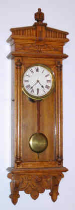 C.1895 Waterbury Clock Co., CT, HALIFAX, 8 day, time only, oak cased wall clock. — Antique Clocks Price Guide