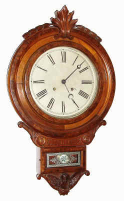 C.1900 William L. Gilbert Clock Co., CT, CIRCLE DROP, 8 day, time and strike wall clock in walnut with burled applique on both inner and outer bezels. — Antique Clocks Price Guide