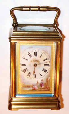 C.1900, French, Brass Cased Carriage clock, time and strike, in a cannelee case, the dial a porcelain plaque with a city river scene in the bottom showing a mother and child, hand painted, with a gilt border. — Antique Clocks Price Guide