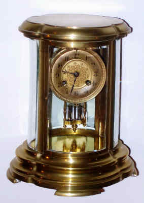 C.1905, French, S. Marti and Cie, 4-Glass crystal regulator in an OVOID or serpentine/oval case, 8-day gong striking. — Antique Clocks Price Guide
