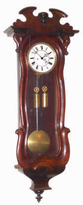 C.1860, Austrian, 2-wt Vienna Regulator, in a serpentine case, dark finish. — Antique Clocks Price Guide