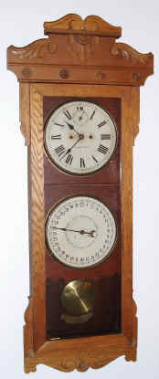 C.1900, American Wringer Co., (by New Haven Clock Co.), 30-day, spring, double dial calendar wall clock. There is a timepiece version of the case elsewhere in the auction. — Antique Clocks Price Guide