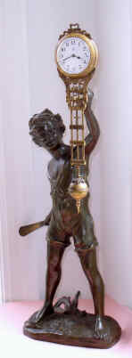 C.1905, German, Junghans, Cricket Player, or BATBOY, patinated spelter swinging arm clock, 8-day. — Antique Clocks Price Guide