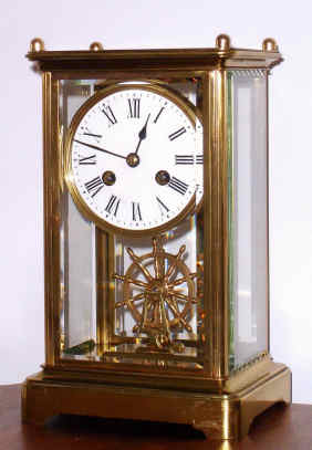 C.1900, French, Brass Cased 4-Glass, CRYSTAL REGULATOR, with rare ships wheel as the "balance" for time regulation, 8-day bell strike. — Antique Clocks Price Guide