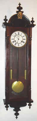 C.1901, Ansonia Clock Co., "Capitol", 8-day double weight wall timepiece. — Antique Clocks Price Guide