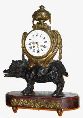 C.1855, French, LeMoyne, Paris, bronze and marble figural clock, THE BOAR, on a red marble base, and the boar surmounted by the time and bell strike movement. — Antique Clocks Price Guide