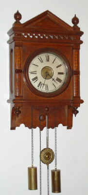 C. 1893 Waterbury Clock Co., "Study No. 3 Weight", 8-day time and strike wall clock. — Antique Clocks Price Guide