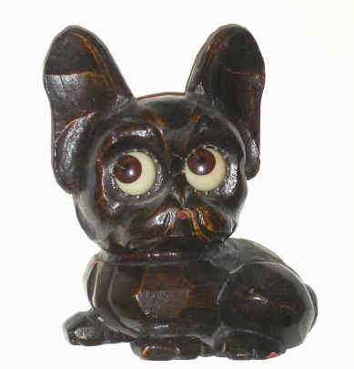 C.1960, German, Oswald Rotating Eye Clock, showing the time by the position of the pupils, in the form of a puppy, molded composition case. — Antique Clocks Price Guide