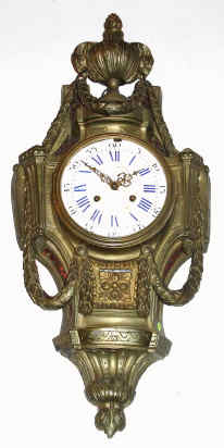 C.1890, French, Samuel Marti, large brass cartel clock in the style of a century earlier. — Antique Clocks Price Guide