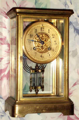 C.1900, French, Japy Freres, 4-Glass CRYSTAL REGULATOR, 8-Day time and gong strike with gilt brass case and porcelain dial with fancy floral center, retailed by Henry Birks and Sons, Ltd.. — Antique Clocks Price Guide