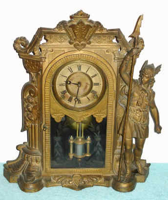 C.1874, Nicholas Muller's Sons and Co., 8-day time and strike cast figural mantel clock. The Muller company produced many different cast clock designs. This model was also offered by Kroeber as the "Sentinel V.P.". — Antique Clocks Price Guide