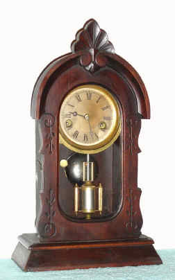 C.1889, F. Kroeber Clock Co., 8 Cortlandt St, NY, FROLIC, walnut cased shelf clock, 1-day time and bell strike. — Antique Clocks Price Guide
