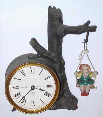 C.1894, Ansonia Clock Co., NY, "SWING No. 2" one day novelty timepiece, with doll that swings front to back. — Antique Clocks Price Guide