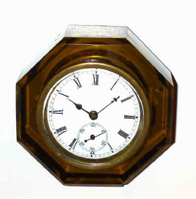 C.1885, E. N. Welch Mfg, JEWEL, back-wind timepiece in a cut glass case, amber/yellow, lever movement. — Antique Clocks Price Guide