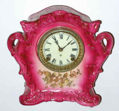 C.1905, Ansonia Clock Co., WAG, porcelain china clock, in dark pink, restored. — Antique Clocks Price Guide