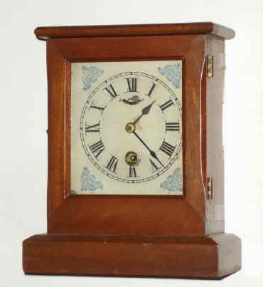C.1876 (dated), American "Centennial Novelty Clock", unsigned, but lever movement by S. E. Root, case of solid walnut with beveled edges. — Antique Clocks Price Guide