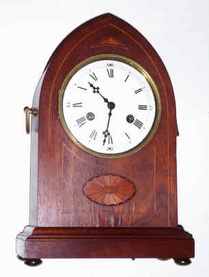 C.1910, German, Philip Haas, Mahogany Lancet top mantel clock with inlay below the dial, 8-day gong strike mov't. — Antique Clocks Price Guide