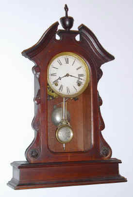 C.1880, Waterbury Clock Co., 8-day time/strike walnut mantel clock, with advertising pendulum. — Antique Clocks Price Guide