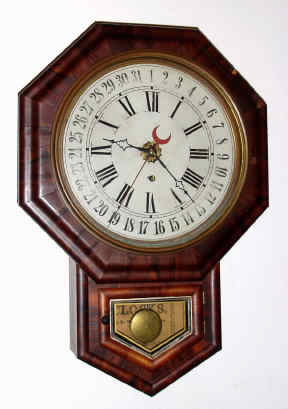 C.1885, E. N. Welch Mfg Co., No. 1 Drop Calendar, in mahogany, 8-day time and calendar. — Antique Clocks Price Guide
