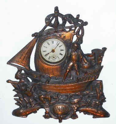 C.1905, Robert Johns Mfg., Chicago, IL, 30-hour lever movement cast iron novelty — Antique Clocks Price Guide