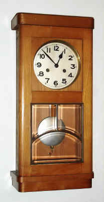 C.1915, German, Kienzle, Edwardian Box clock, with beveled glass in door, case of light maple. — Antique Clocks Price Guide