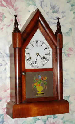 C.1870, Wm. L. Gilbert, 30 hour steeple, full size, mahogany veneer. — Antique Clocks Price Guide