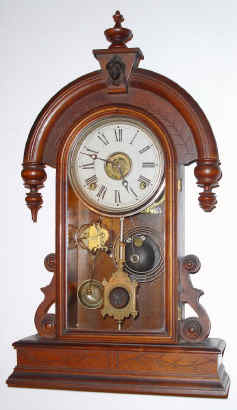 C.1885 E. NH. Welch Mfg. Co., "Parisian", 8-day time and strike walnut mantel clock. — Antique Clocks Price Guide
