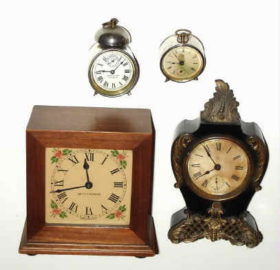 Lot of 4 better American alarm clocks; — Antique Clocks Price Guide