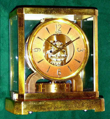 C.1955, Swiss, LeCoultre, ATMOS, perpetual running clock in a brass and glass case, serial 54,980. — Antique Clocks Price Guide