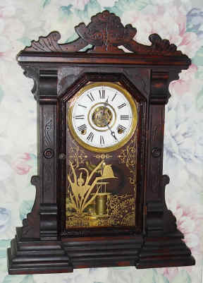 C.1889, E. Ingraham and Co., 8-day time/strike/alarm walnut mantel clock, with restorations. — Antique Clocks Price Guide