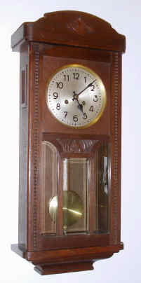 C.1915, German, P Haas, Edwardian Box clock, 8-day rod strike in an oak case with 3 panes of beveled glass in the door. — Antique Clocks Price Guide