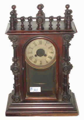 C.1880, Welch, GERSTER, rosewood case only, no label, barn fresh, with a dial pan from another clock, but correct diameter. — Antique Clocks Price Guide