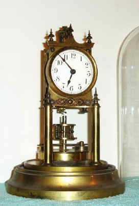 C.1910, German, Gustav Becker, 400-Day, disc pendulum or "Anniversary" clock, serial No. 2,450,484. — Antique Clocks Price Guide