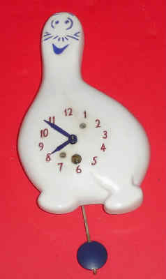 C.1951, Lux Mfg. Co, "SHMOO", 30-hour novelty timepiece, white plastic figure/case. — Antique Clocks Price Guide