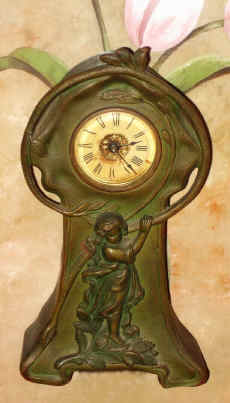 C.1895, Western Clock Mfg, Co., Chicago later became Westclox, cast iron novelty clock in the Art Nouveau style, 30 hour time only mov't. — Antique Clocks Price Guide