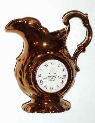 C.1890, English, Copper Loster Pitcher, with a clock face on one side, and a Japanese man in his garden on opposite side. — Antique Clocks Price Guide