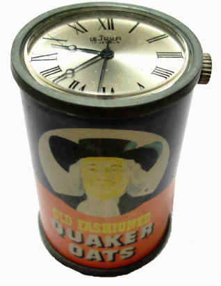 Novelty Sales Clock- Small Quaker Oats form clock inset with LeJour movement manual 17J with sweep seconds hand, 60mm H, — Antique Clocks Price Guide