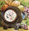 C.1938, United Electric Clock Corp, Brooklyn, NY, WINE BARREL animated novelty, dial with a bar scene showing a bartender shaking a drink, the canister shaking with each tick of the clock; barrel is patinated spelter.