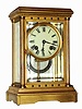 C.1895, Ansonia Clock Co., 4-Glass fancy crystal regulator with Corinthian columns at each corner, identical to the case used by Boston Clock Co for their DELPHUS model. Also has a platform lever on the real plate, time and gong strike.
