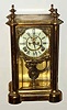 C.1894, Ansonia Clock Co., "Symbol Extra", 8-day time/strike crystal regulator mantel clock with open escapement on the dial.