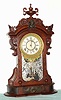 C.1880, Ansonia Clock Co., MONARCH, 8-day time and strike parlor clock, with heavy cast bezel as used on the "Crystal Palace" series, in black walnut.