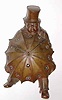 C.1900, French, Novelty figural timepiece, a detailed bronze casting of a portly Englishman in top hat, holding his umbrella against the wind, and the clock hands, 8-day, platform mov't.