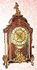 C.1890, French, Boulle Clock, in the style of a century earlier, the dial with a signet signed Thuret, Paris; inlaid brass into shell veneer and with cast bronze mounts, the brass dial with 12 individual porcelain signets with Roman numerals.