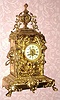 C.1890, French, Large Brass Mantel clock, profusely decorated with torches and urns and with 3 lions [sides and lower front]. 8-day, striking.