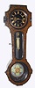 C.1865, German, Gustav Becker, Freiburg-i/S, 1-Wt Vienna Regulator, in an inlaid case. The movement with black porcelain dial and gilt numerals, pendulum with multi color cloisonne enamel, and the special pulley with black enamel inlay, and the original weight with enamel trim caps top and bottom, orig movement serial No. 146490